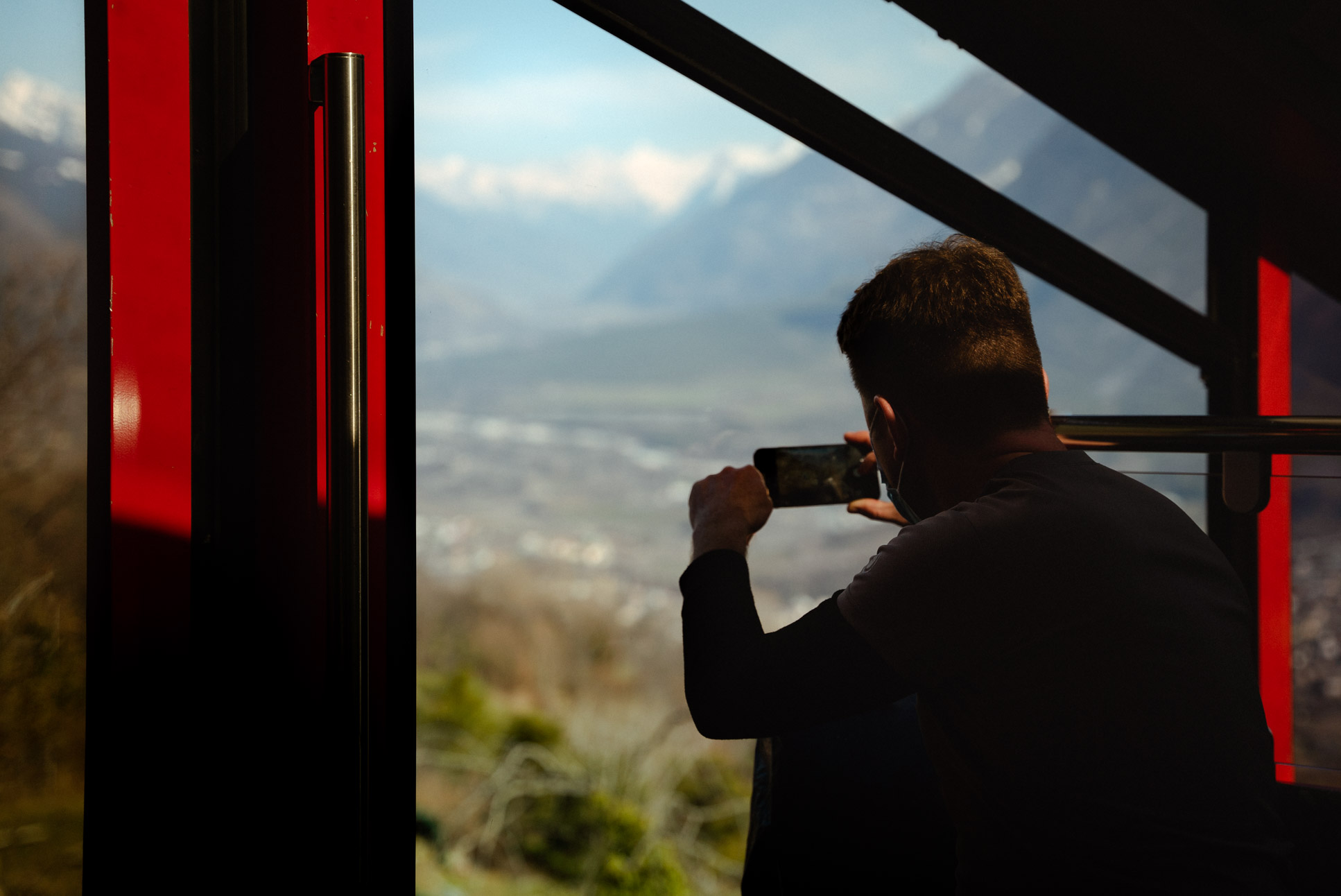 Enjoying the view of the river Rhone from a funicular. Enjoying the view of the river Rhone from a funicular.