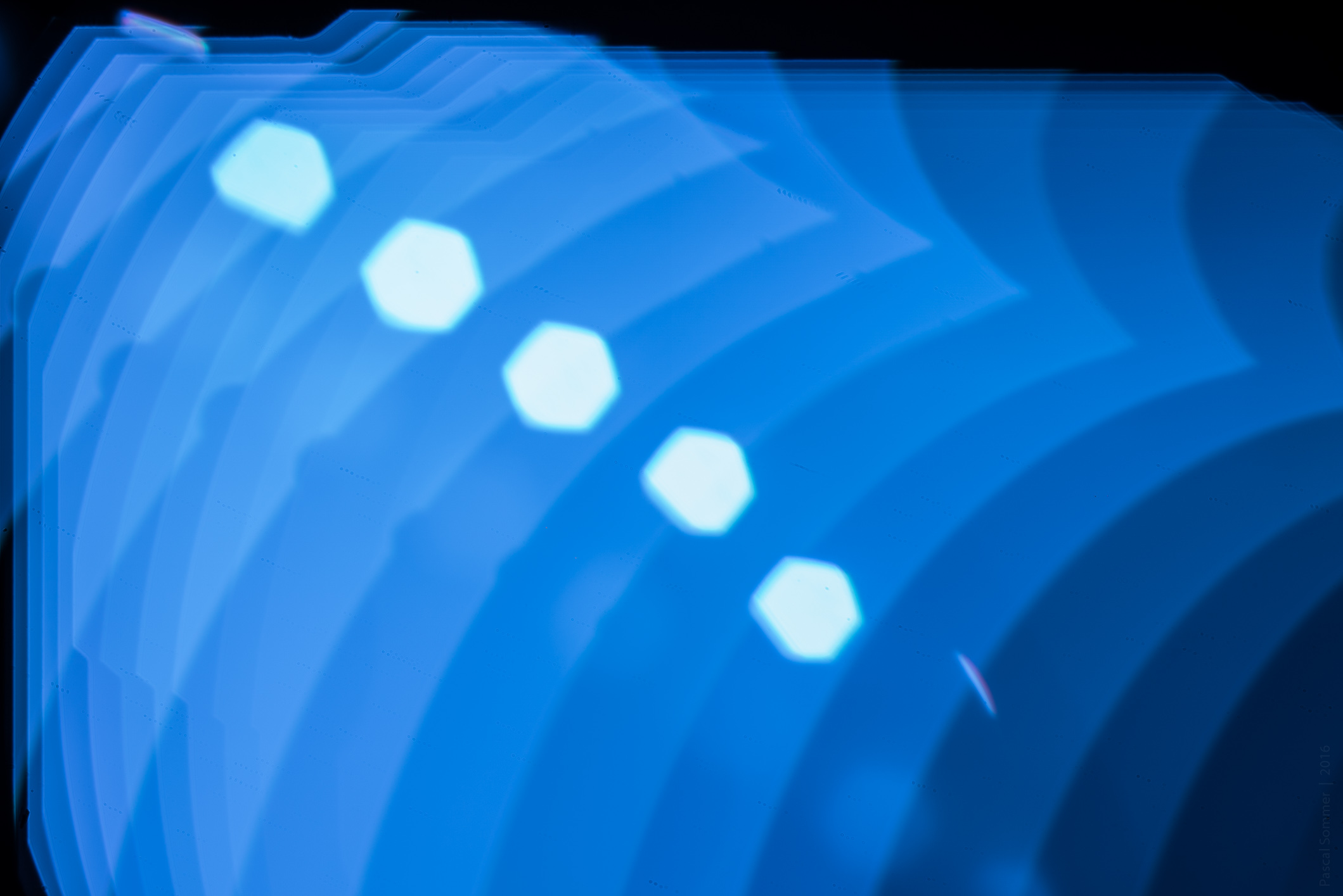 Using a 50mm lens not attached to the body, and a lot of LEDs