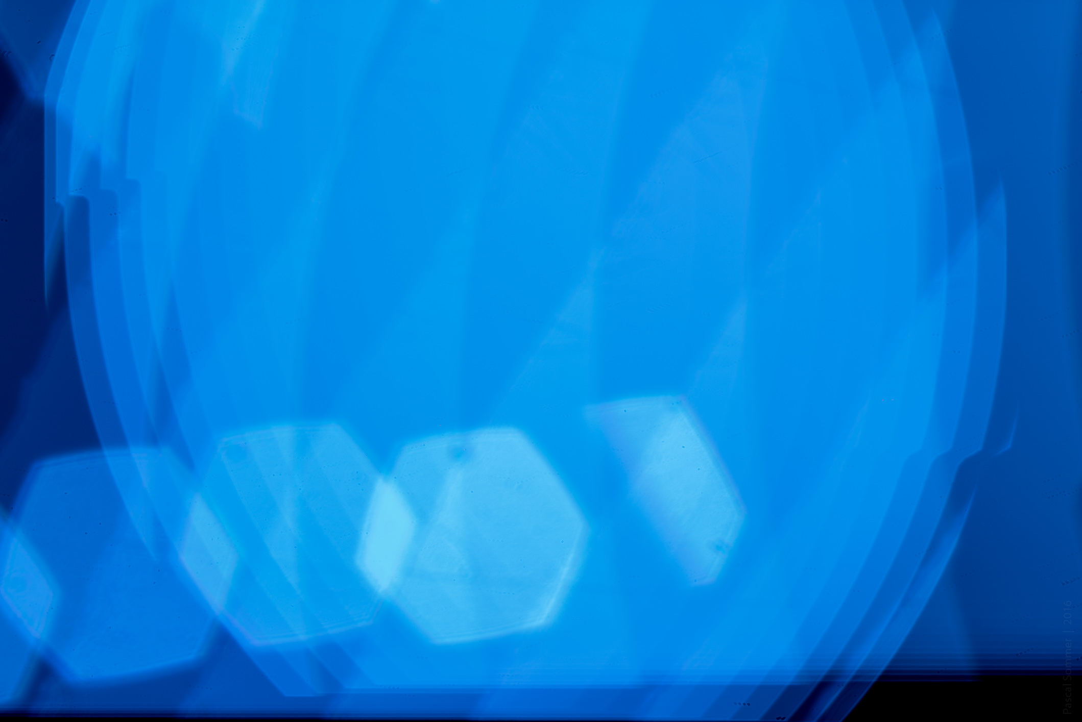 Using a 50mm lens not attached to the body, and a lot of LEDs