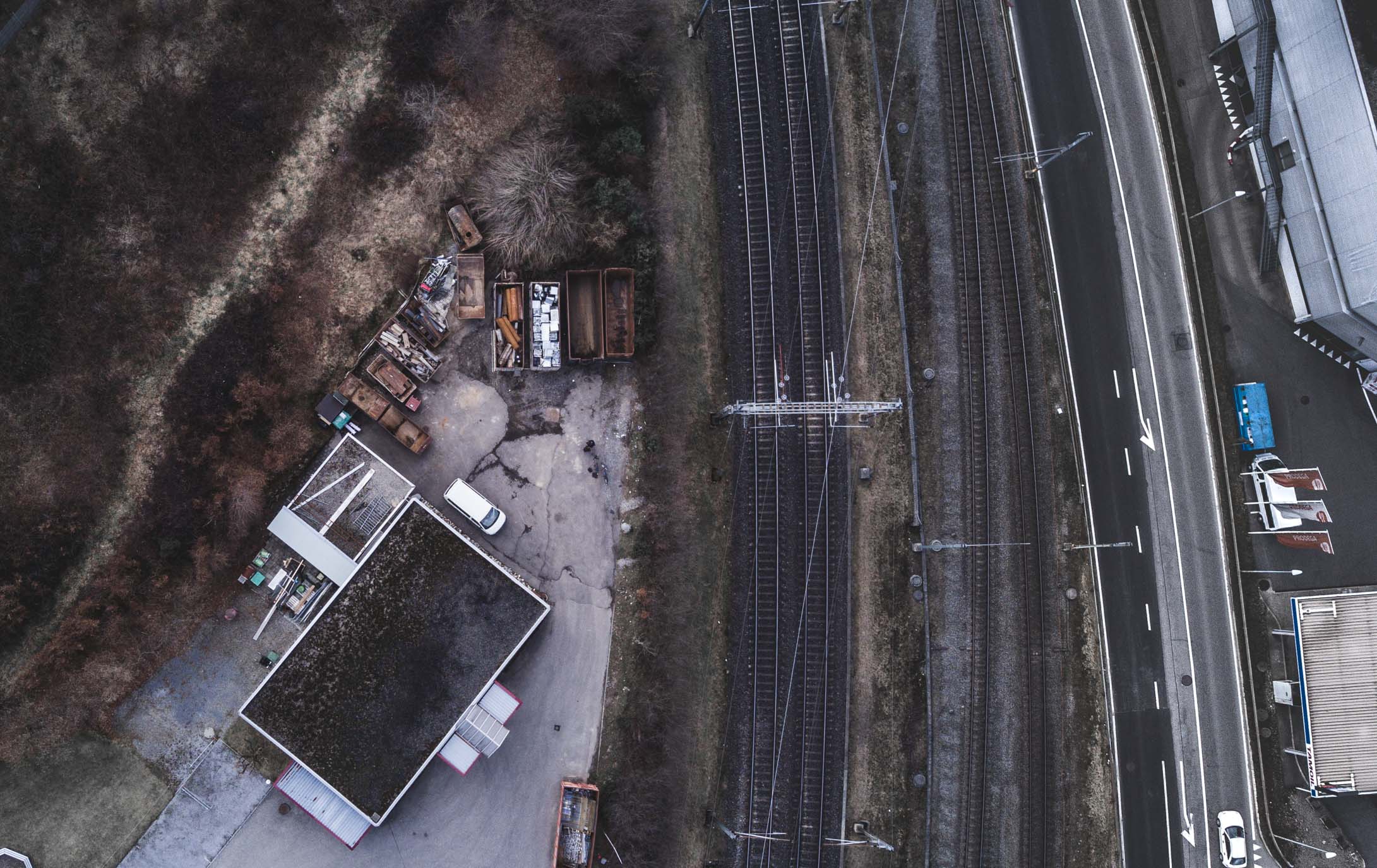 I feel like grungy aerial shots is the way to go