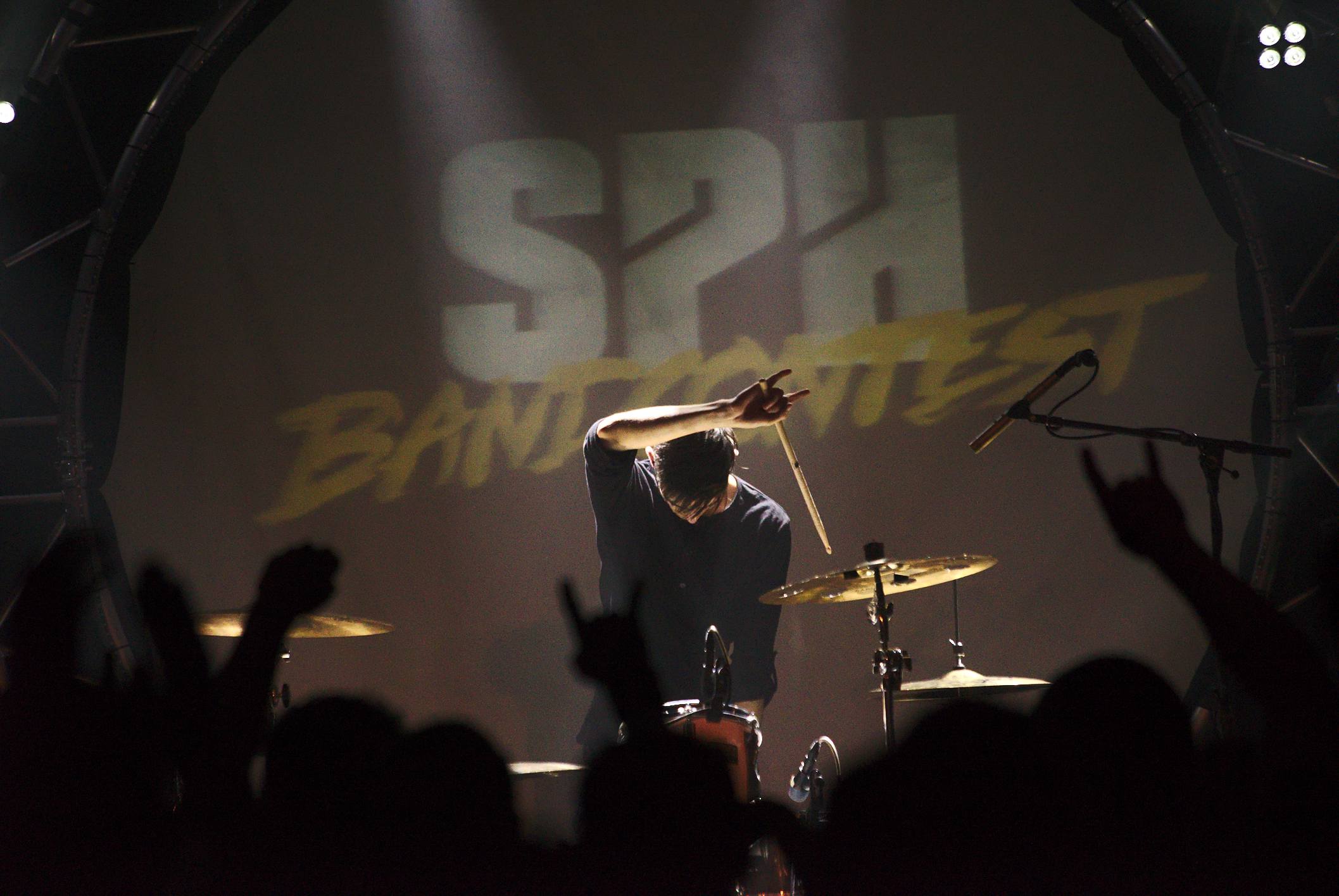 The drummer, finishing his solo with style