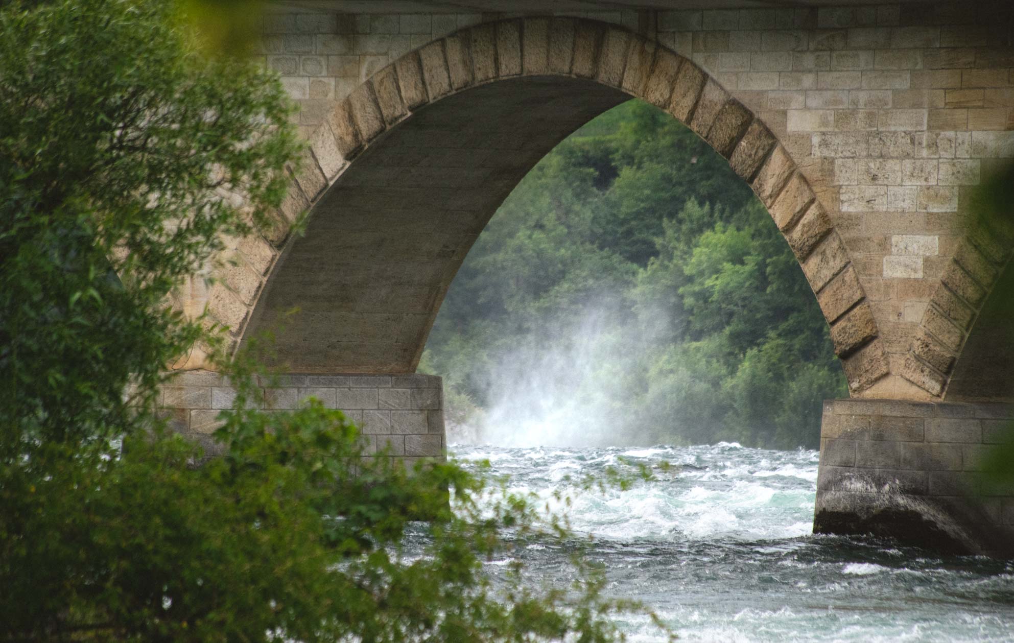 This bridge is further from the waterfall than what you'd think from this photo.