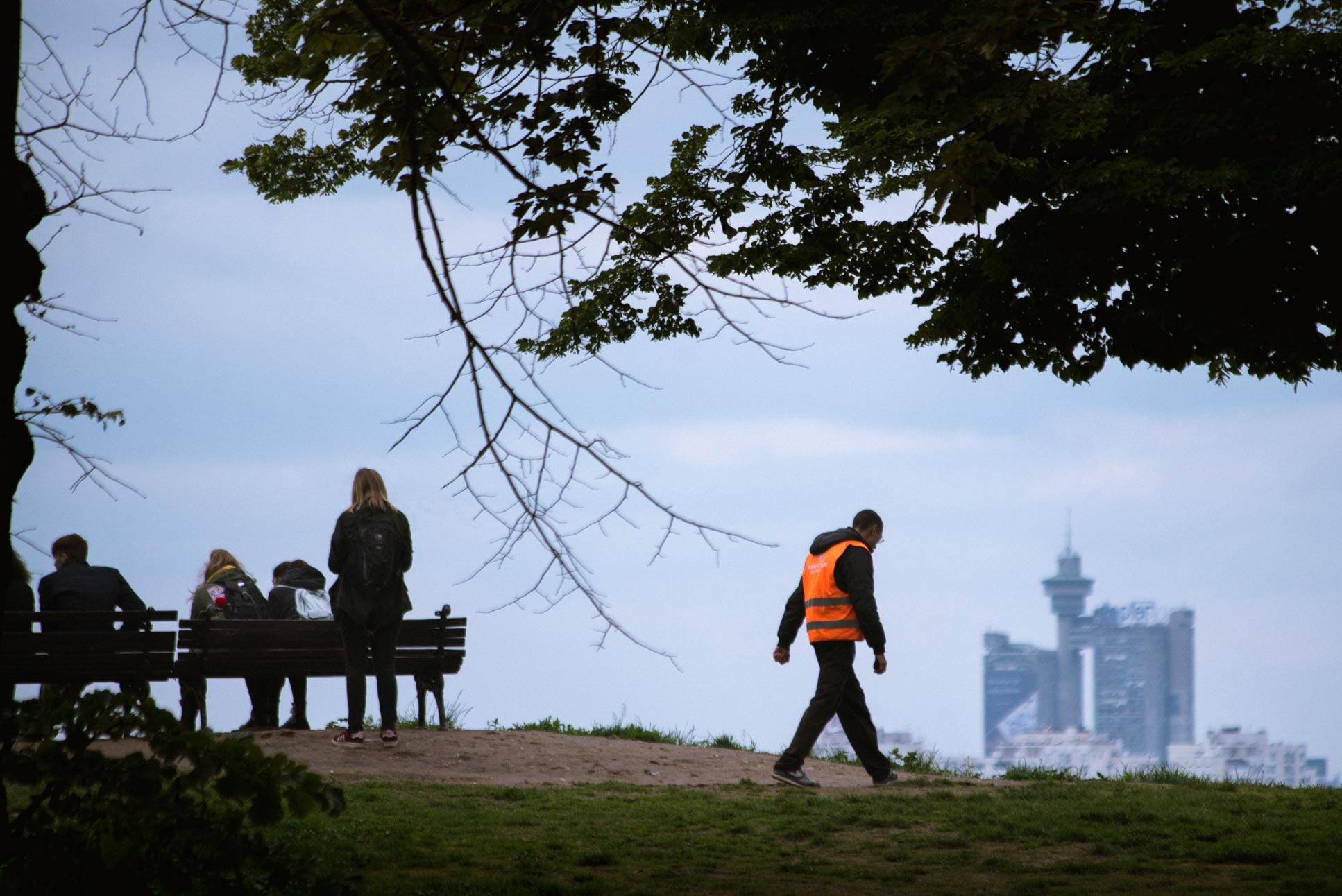 Visible in the background is the Genex Tower